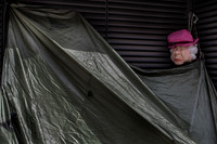 Petticoat Lane - Spitting Image puppet of Queen in homeless person's tent.